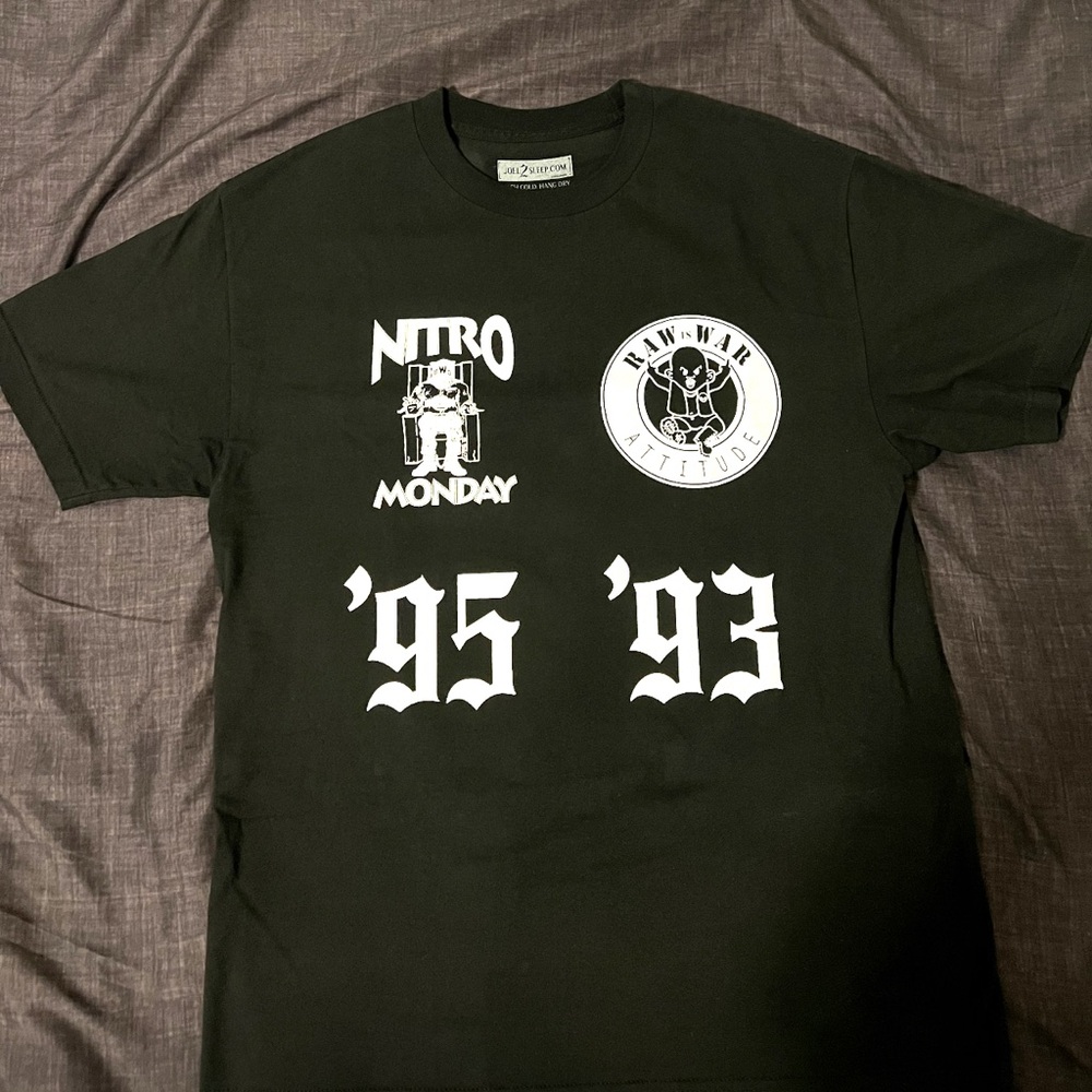 Monday night wars shirt.